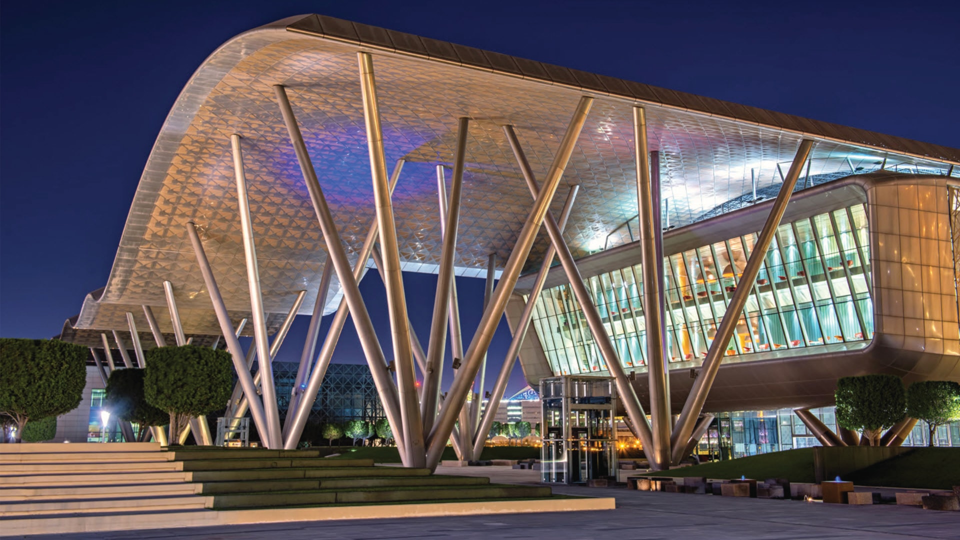 Qatar National Convention Centre illuminated at dusk