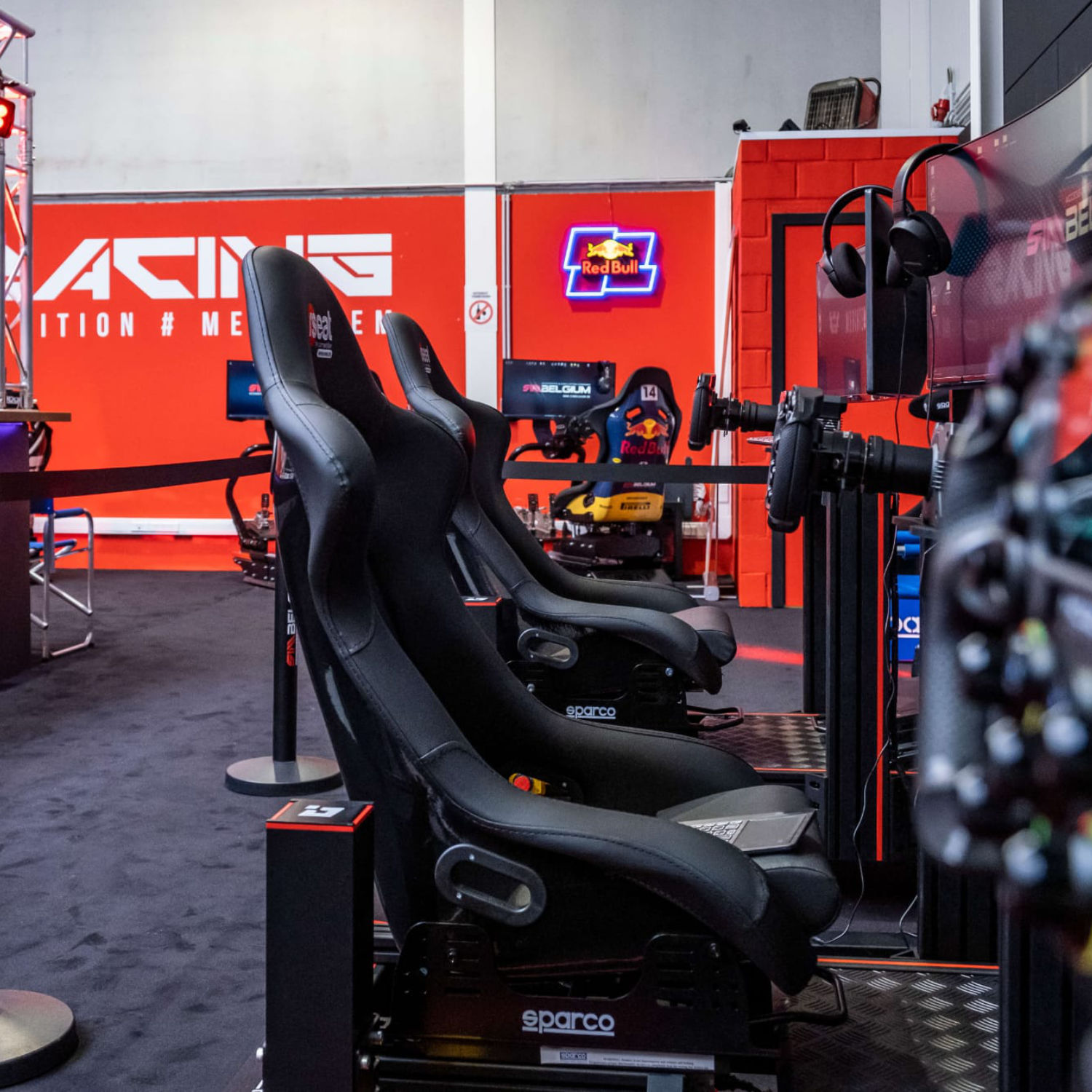 Bucket-seat racing simulators in the SimBelgium Sim Racing Center